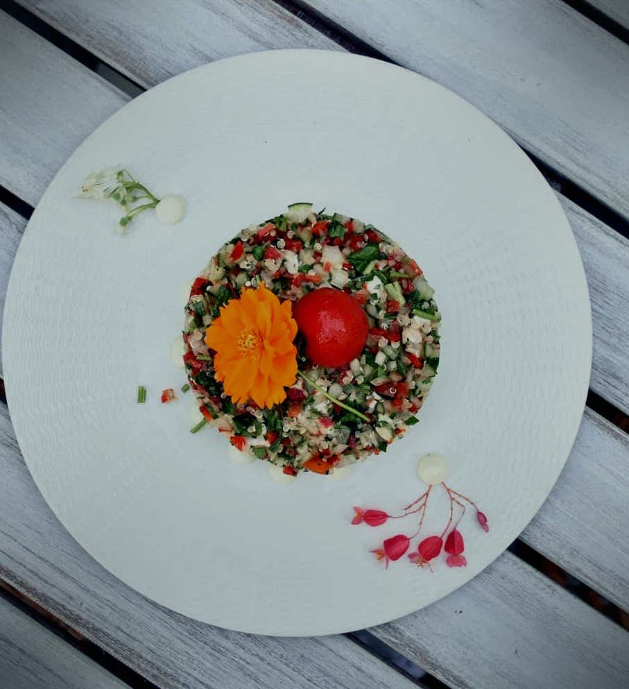 Fresh herb salad with edible flowers